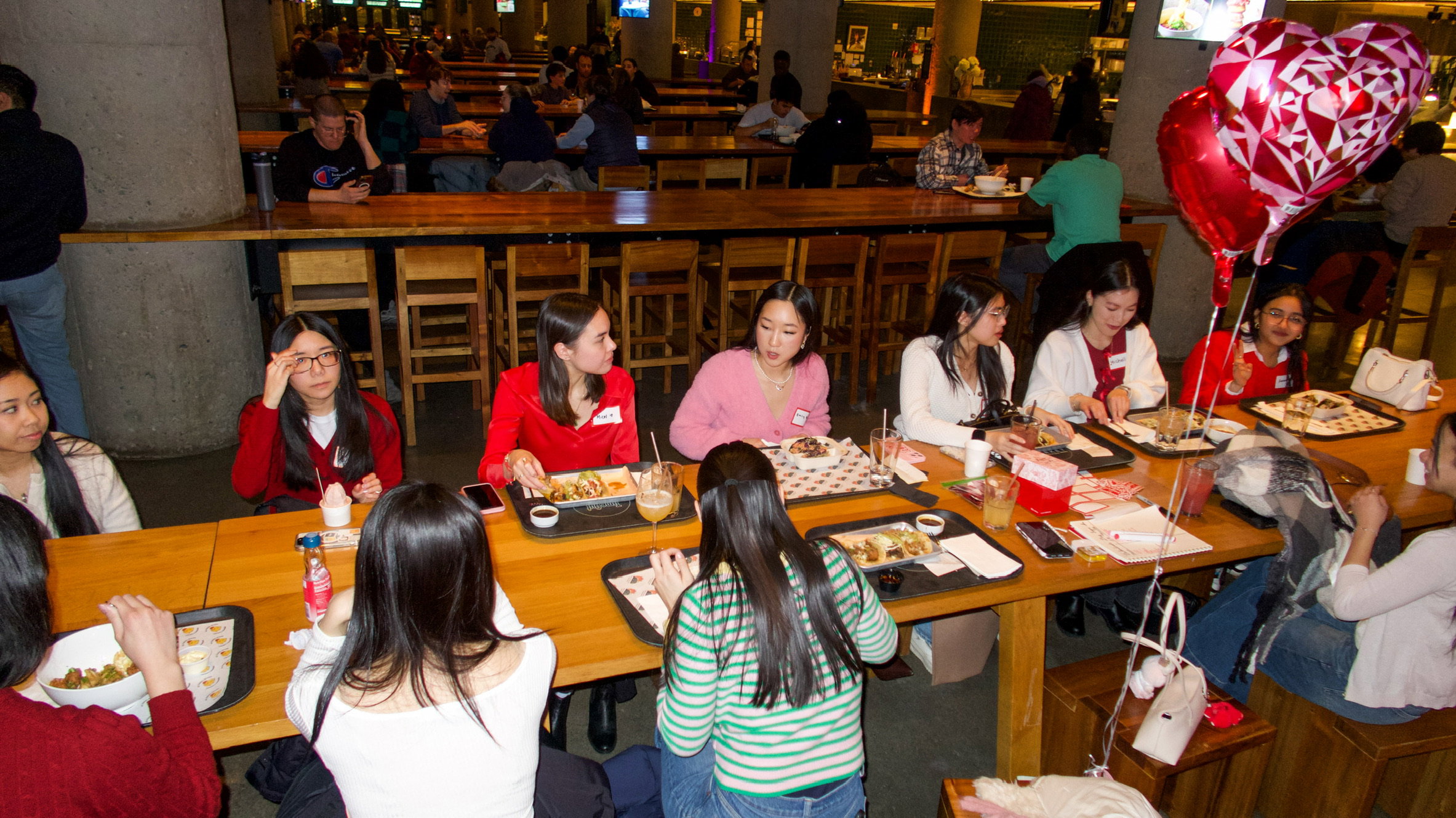 Asian Girlies of Boston members gathered at a Galentine's Day event in Boston
